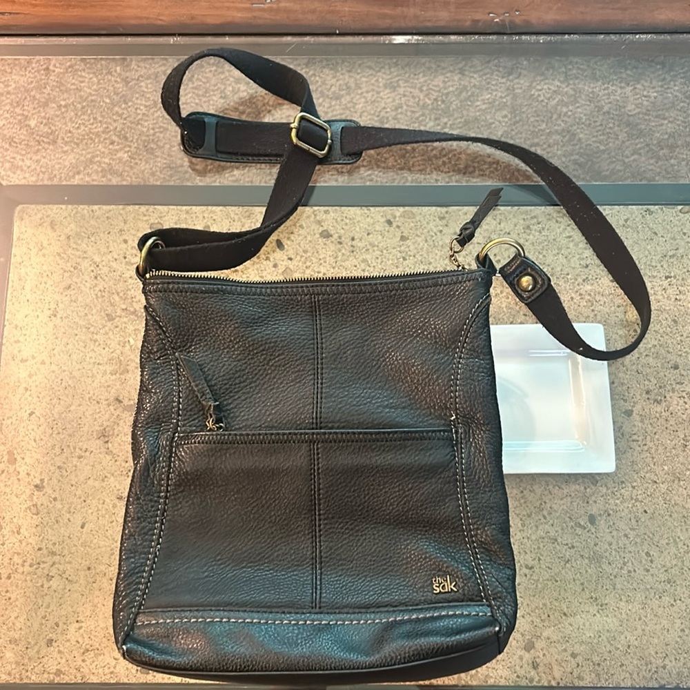 The sak black leather crossbody purse